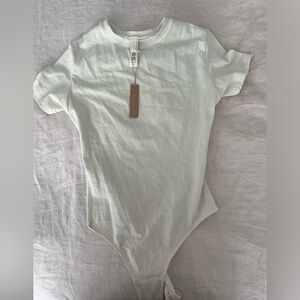 Skims Bodysuit Size small, new with tags, Bone color